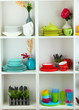 Beautiful white shelves with tableware and decor.