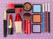 Decorative Cosmetics On Purple...