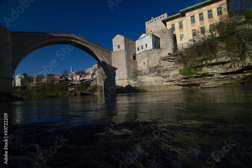 Photo: Old bridge over river Neretva in Mostar, Bosnia and Herzegovina Old bridge over river Neretva in Mostar, Bosnia and Herzegovina
