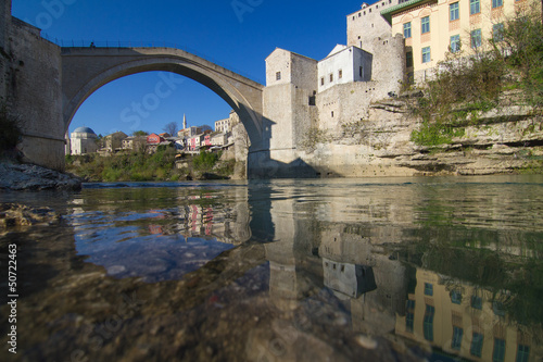 Photo: Old bridge over river Neretva in Mostar, Bosnia and Herzegovina Old bridge over river Neretva in Mostar, Bosnia and Herzegovina