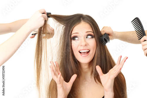 Photo: Woman with long hair in beauty salon, isolated on white Woman with long hair in beauty salon, isolated on white