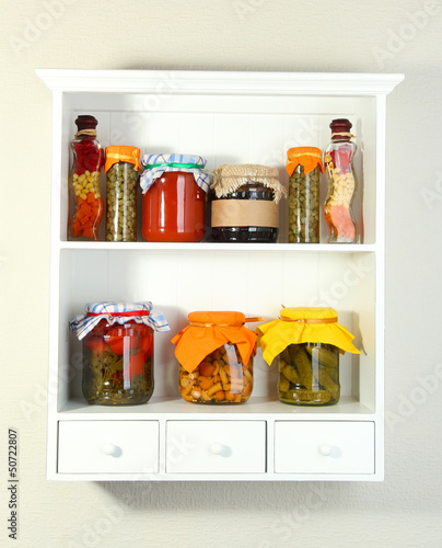 Photo: Homemade preserves on beautiful white shelves Homemade preserves on beautiful white shelves