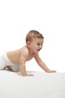 Photo: Happy baby gambling on a towel Happy baby gambling on a towel