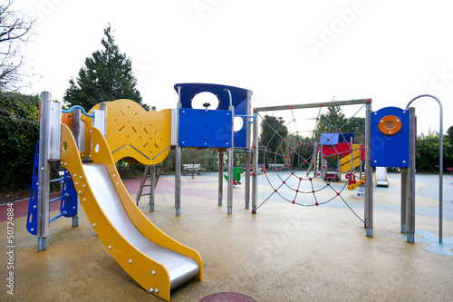 Photo: Slide and climbing web in children's playground Slide and climbing web in children's playground