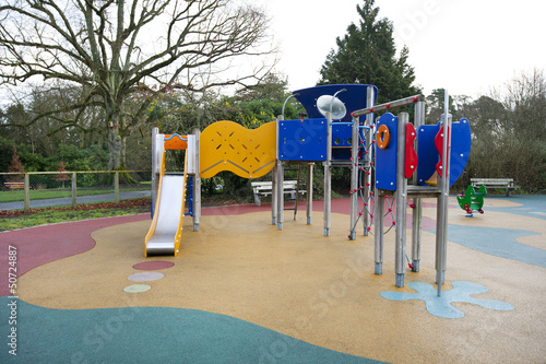 Photo: Slide and other equipment in a children's play ground Slide and other equipment in a children's play ground
