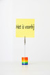 Photo: Sticky notepaper with Dutch text "Het is voorbij" (It's over) clipped to a multicolored card holder Sticky notepaper with Dutch text "Het is voorbij" (It's over) clipped to a multicolored card holder
