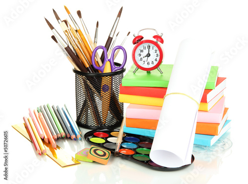 Photo: School supplies isolated on white School supplies isolated on white