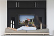 Photo: Back view of mid-adult man changing channels with television remote control in living room Back view of mid-adult man changing channels with television remote control in living room