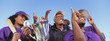 Photo: Panoramic shot of cheerful baseball players with trophy celebrating victory against clear sky Panoramic shot of cheerful baseball players with trophy celebrating victory against clear sky