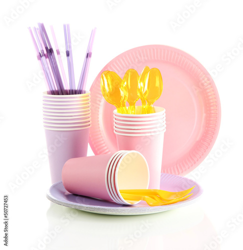 Photo: Multicolored plastic tableware isolated on white Multicolored plastic tableware isolated on white