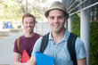 pair of happy young male students