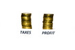 Taxes and profit signs at coin piles