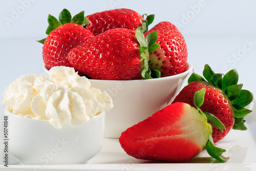 Photo: Dessert, fresh strawberries and whipped cream Dessert, fresh strawberries and whipped cream
