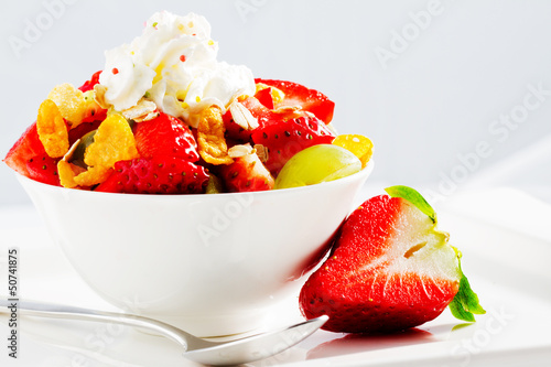 Photo: Diet, muesli with strawberries and fruit salad Diet, muesli with strawberries and fruit salad