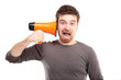 Young man shouting through megaphone