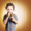 Photo: Lovable Little Child Eating Chocolate Easter Bunny Lovable Little Child Eating Chocolate Easter Bunny