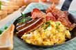 Rühreier mit Würstl und Speck