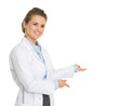 Photo: Happy woman in white robe inviting Happy woman in white robe inviting