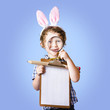 Delightful young boy holding easter wish list