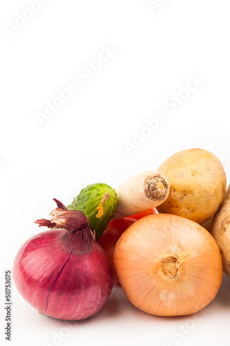 Photo: vegetables and grater isolated on white vegetables and grater isolated on white