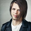 portrait of a young man with a long bangs