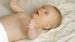 HD1080p Baby laying on a blanket and making strange noise