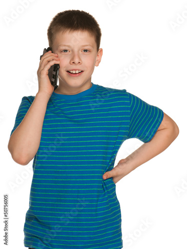 Photo: Cheerful boy with a cell phone Cheerful boy with a cell phone