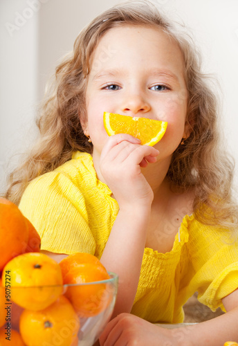 Photo: Child with oranges Child with oranges