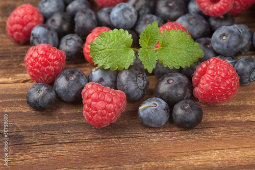 Photo: Blueberries with raspberries on wood IV Blueberries with raspberries on wood IV
