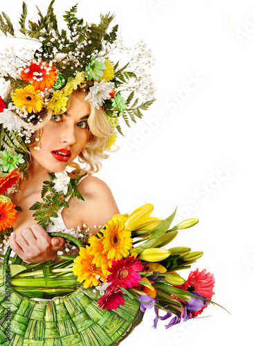Photo: Woman with make up and flower. Woman with make up and flower.