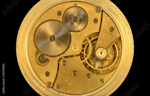 Photo: closeup clock mechanism closeup clock mechanism