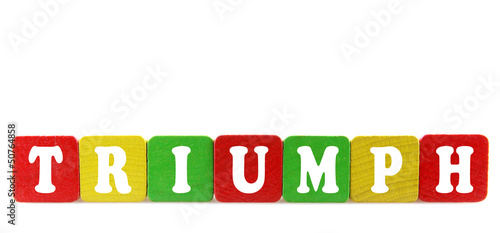 Photo: triumph - isolated text in wooden building blocks triumph - isolated text in wooden building blocks