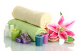 towels with lily, aroma oil,  candles, soap and sea salt