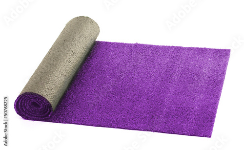Photo: Artificial rolled violet grass, isolated on white Artificial rolled violet grass, isolated on white