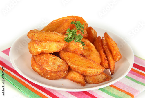 Photo: Appetizing village potatoes on plate isolated on white Appetizing village potatoes on plate isolated on white