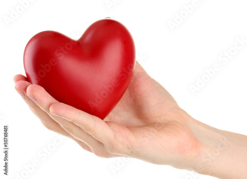 Photo: Red heart in man hand, isolated on white Red heart in man hand, isolated on white
