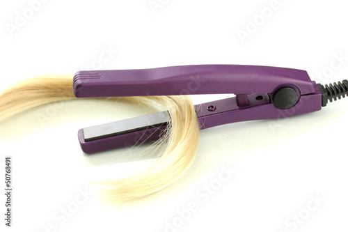 Photo: Hair straighteners and hair, isolated on white Hair straighteners and hair, isolated on white