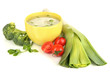 Diet soup with vegetables in cup isolated on white
