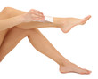 Beautiful woman legs with depilation cream, isolated on white