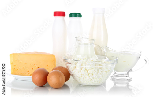 Photo: Dairy products and eggs isolated on white Dairy products and eggs isolated on white