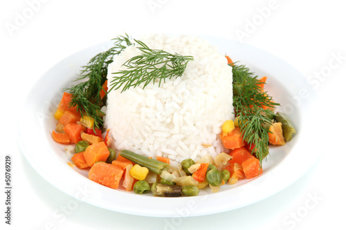 Photo: Delicious risotto with vegetables isolated on white Delicious risotto with vegetables isolated on white