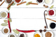 Spices and dried vegetables on vintage white planks