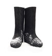 Russian traditional winter felt boot valenki on the snow