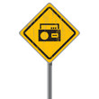 Old shabby yellow sign with an old-fashioned cassette recorder.
