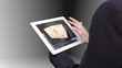 Video: Woman using tablet to view holographic education videos Woman using tablet to view holographic education videos