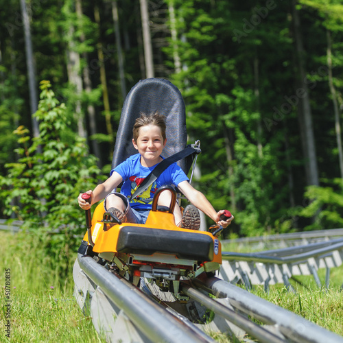 Photo: Gas geben auf der Sommerrodelbahn Gas geben auf der Sommerrodelbahn
