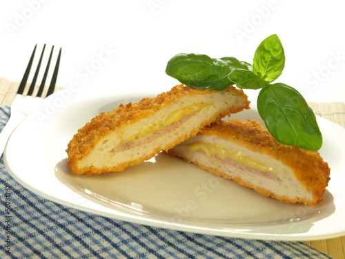 Photo: Cut cordon blue, isolated Cut cordon blue, isolated
