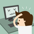 Frustrated man sitting desperate over work at desk
