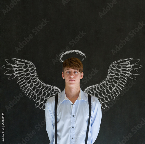 Photo: Business angel investor man with chalk wings and halo Business angel investor man with chalk wings and halo