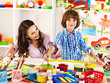 Photo: Family with child painting . Family with child painting .
